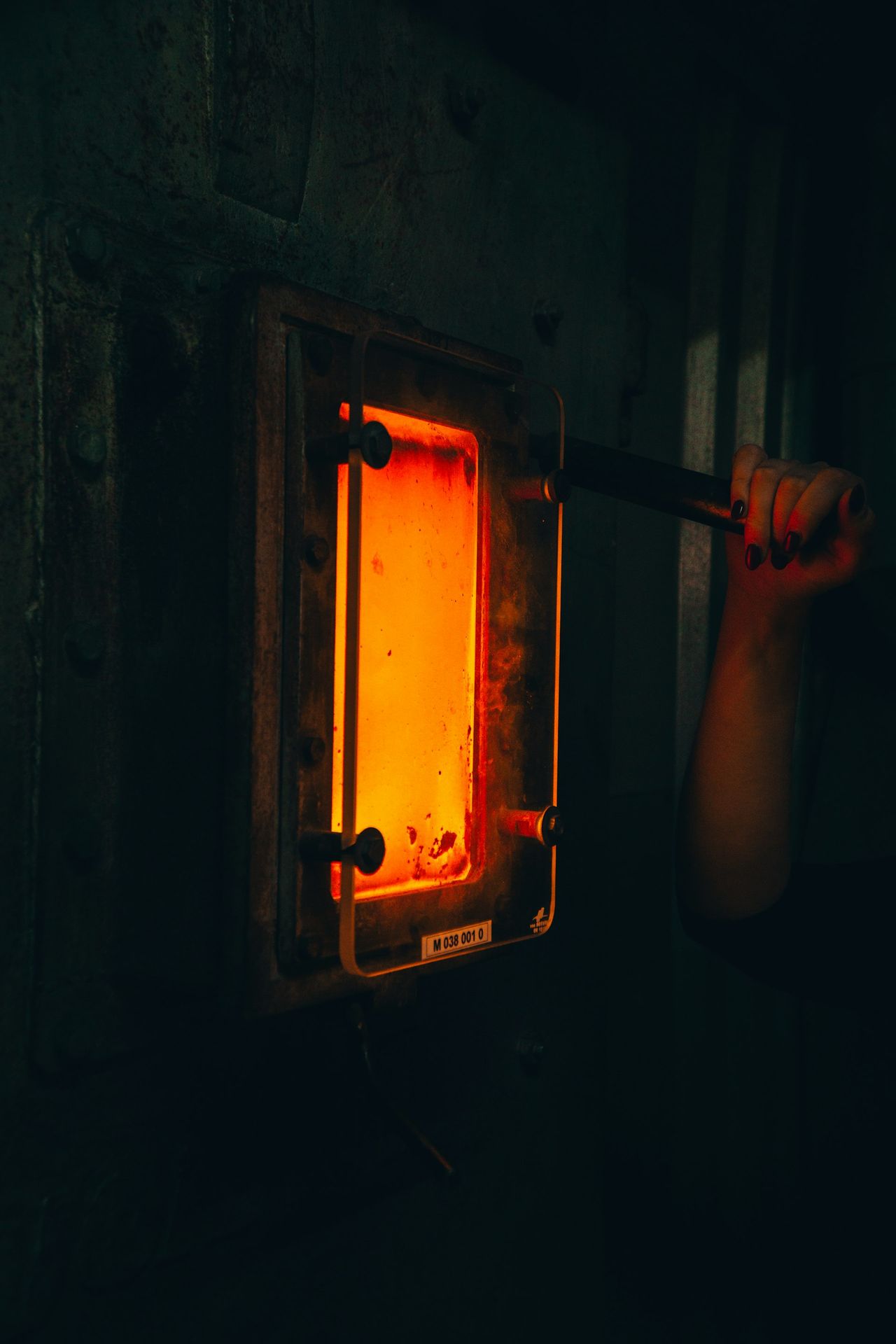 person holding black metal frame